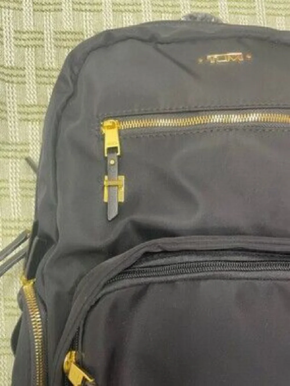 Tumi Black Nylon Backpack with Gold Hardware Accents